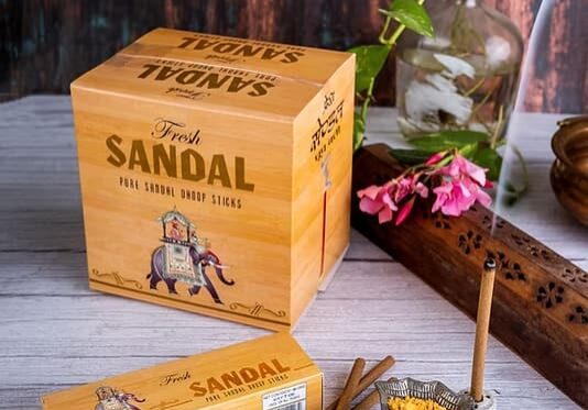 Wooden incense holder and sandalwood sticks